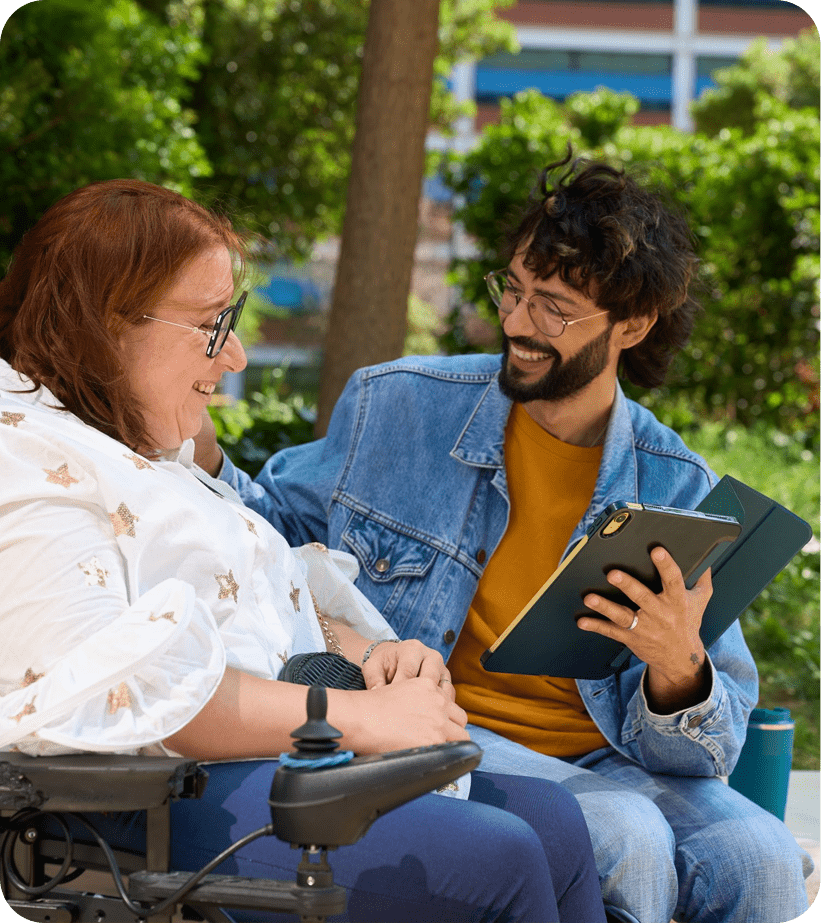Person in a wheelchair smiling